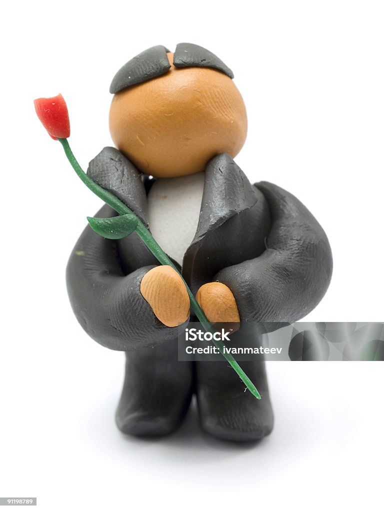Man with Red Rose Clay man holding one red rose in his hand Adult Stock Photo