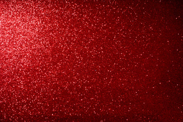 istock red glitter bokeh lights Blurred abstract background for Valentines, birthday, anniversary, wedding, new year and Christmas 911987998