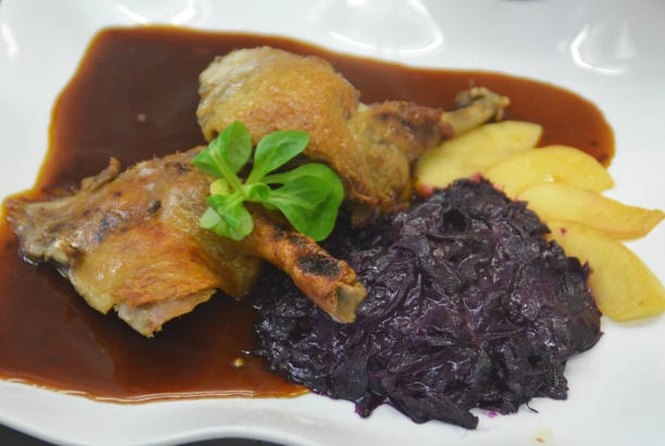 istock Grilled duck leg in red wine sauce 911988136