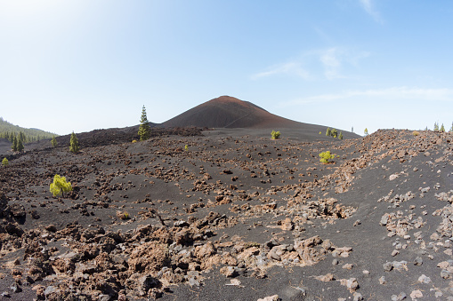 Path through black volcanic desert