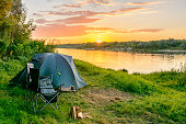 Camping tent in a camping in a forest by the river
