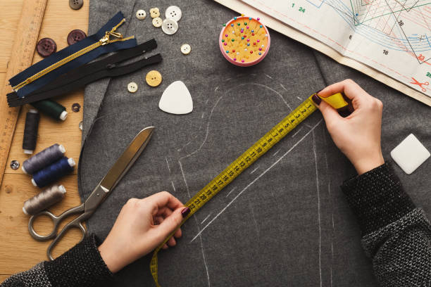 istock Top view on fashion designer working at messy table 912003540
