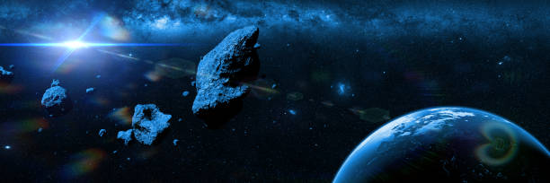 istock a swarm of asteroids moving towards planet Earth 912004590