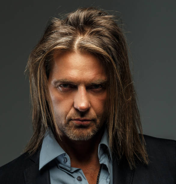 istock Portrait of stylish long-haired man. 912004680