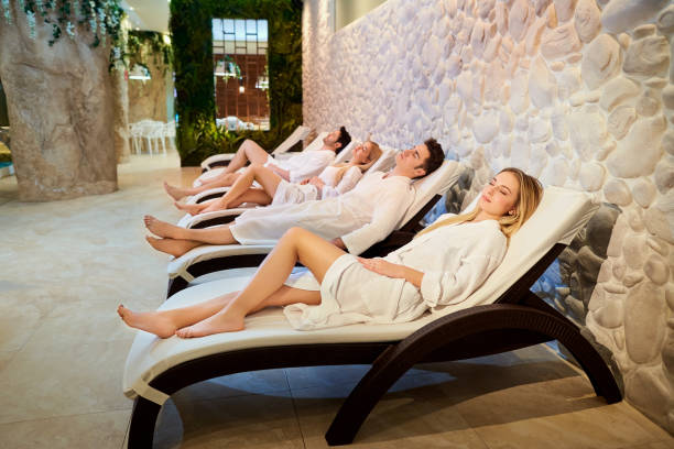 istock People in bathrobes are resting in the spa salon 912006814