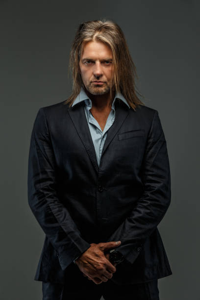 istock Portrait of stylish long-haired man. 912006952