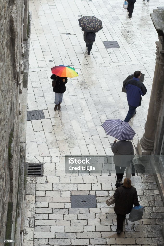 Colour your day Rainy  day , a colorful umbrella in the street City Stock Photo