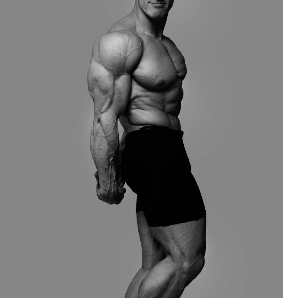 istock Portrait of muscle man on competitions 912012044