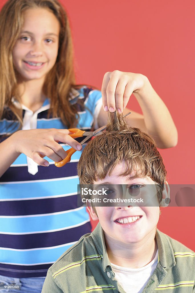 Girl Cutting Boys Hair Vertical Stock Photo - Download Image Now - Animal  Hair, Beautician, Beautiful People - iStock