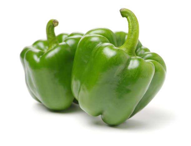 istock Isolated green capsicum couple on the white background 912016426