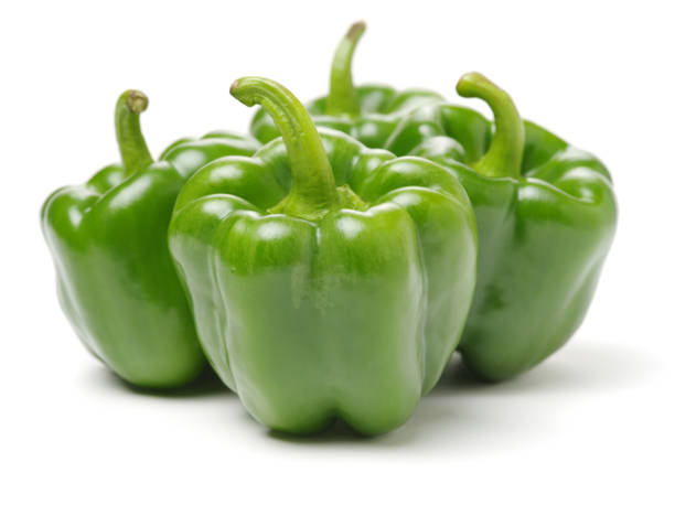 istock Isolated green capsicum couple on the white background 912018916