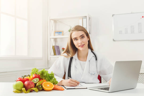 istock Female nutritionist working on laptop 912018940