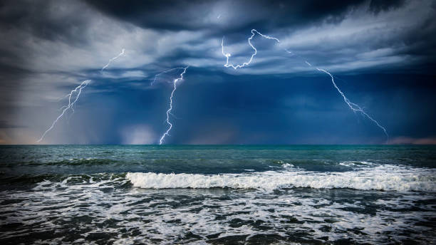 istock Dark sea  storm with lgihting and waves at night. 912019784