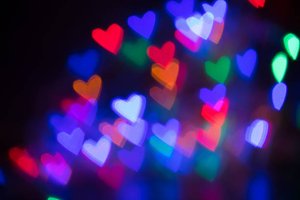 istock Abstract blurry colorful hearts shape with copy space for your text. Concept for valentine's day celebration or couple of love. Bokeh Background 912020224