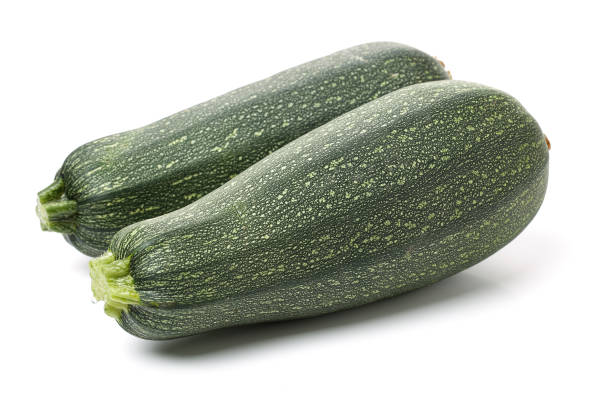 istock fresh zucchini isolated on white  background 912023414