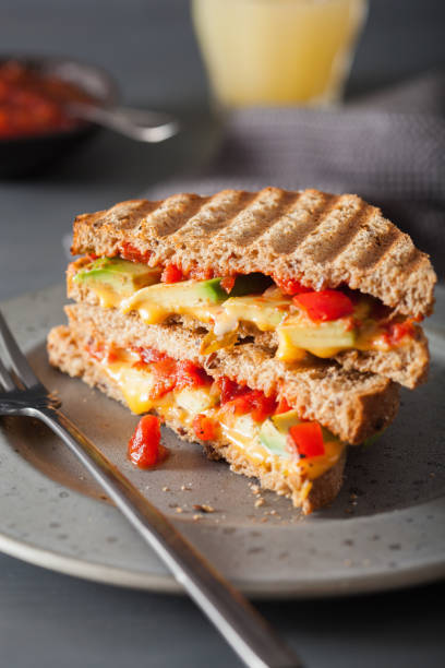 istock grilled cheese sandwich with avocado and tomato 912028786