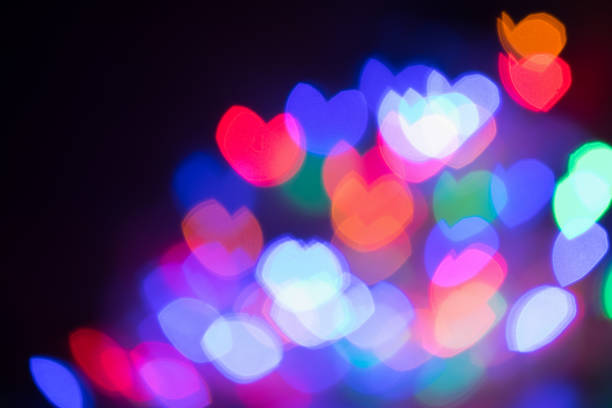 istock Abstract blurry colorful hearts shape with copy space for your text. Concept for valentine's day celebration or couple of love. Bokeh Background 912029578