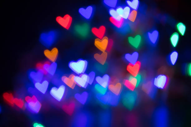 istock Abstract blurry colorful hearts shape with copy space for your text. Concept for valentine's day celebration or couple of love. Bokeh Background 912029600