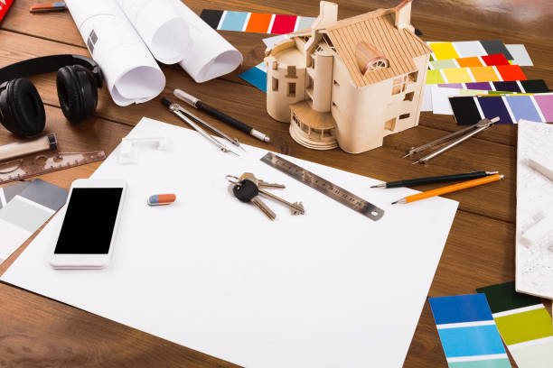 istock Decorator workplace with color swatches and tools 912037410