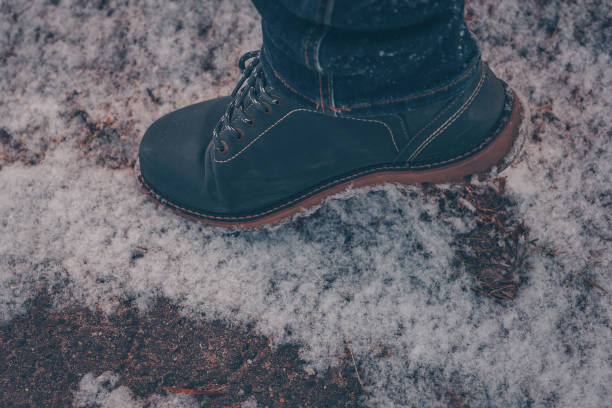istock A trace on the snow from the boot, a step into the unknown 912047138