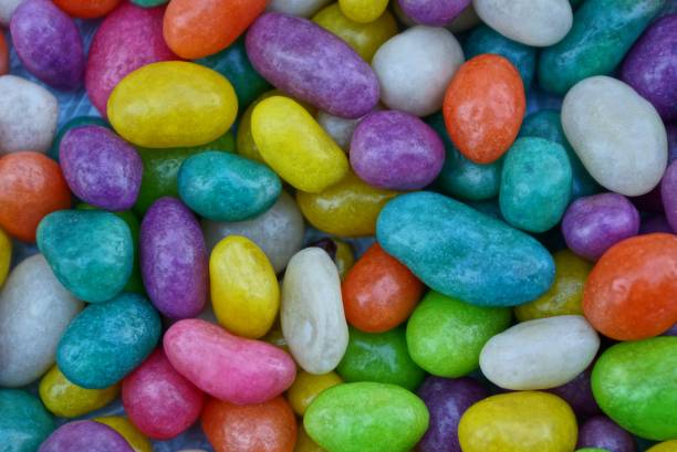 istock colored texture of a pile of small chocolate 912054088
