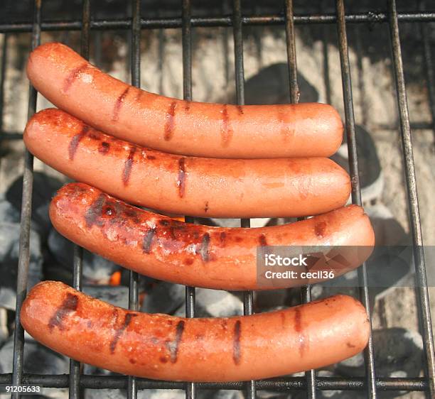 Four Hot Dogs Stock Photo - Download Image Now - Grilled, Hot Dog, Barbecue - Meal