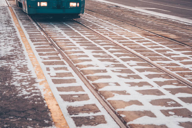 istock Tramways covered with snow, on the frozen rails comes a tram 912065018