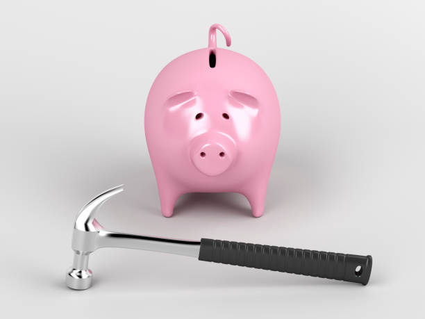 istock Piggy bank and hammer 912065214