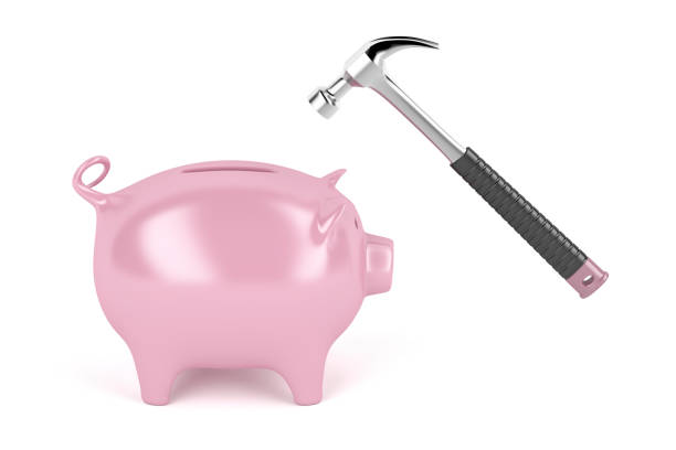 istock Piggy bank and hammer 912065318