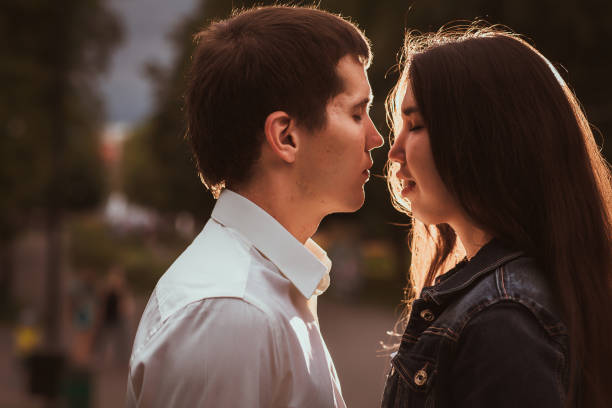 istock Beautiful young couple on the waterfront 912065494