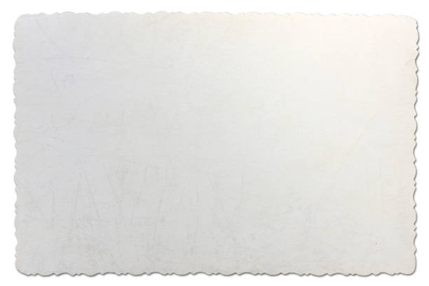 istock Old photo paper texture with scratches isolated on white background. 912065816