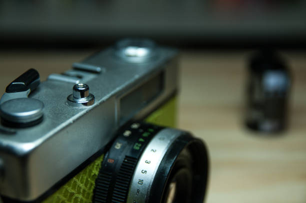 istock Old film camera and film. 912068392