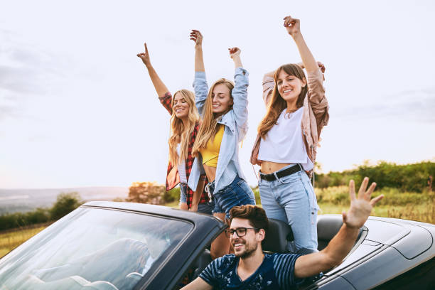 istock Teenagers riding in the car. 912069650