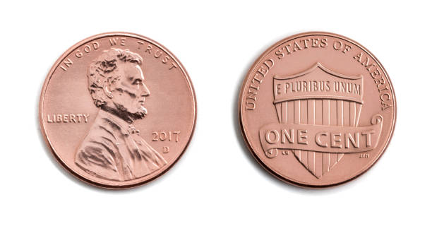 istock american one cent, USA 1 c, bronze coin isolate on white background. Abraham Lincoln on copper coin realistic photo image - both sides 912072178