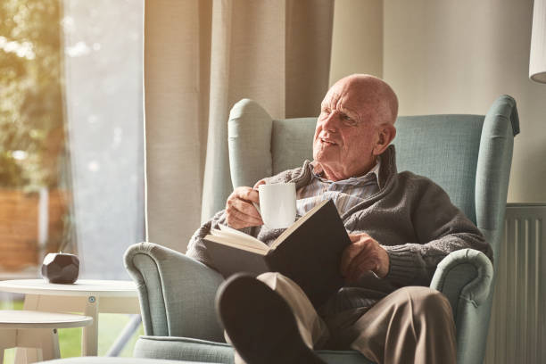 istock Elderly man relaxing at home 912073224
