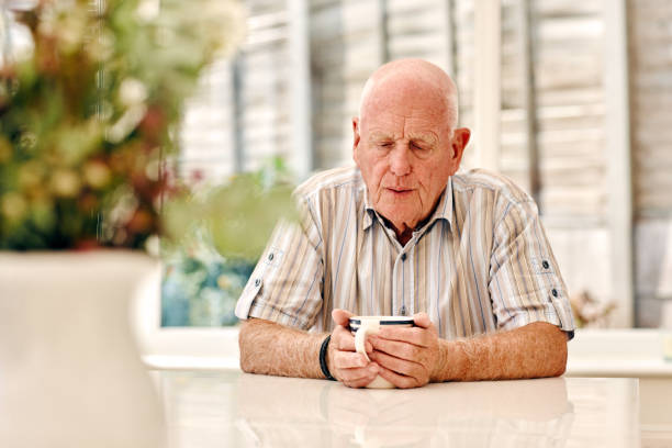 istock Retired elderly man with a cup of coffee at home 912073408