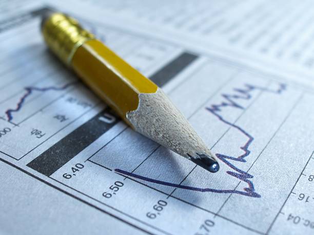 istock Pencil on stock charts 91208255
