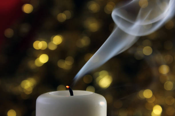 Focus on single candle in foreground.