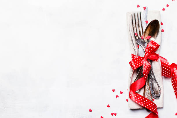 istock Festive table setting for Valentines Day, set of cutlery 912087534