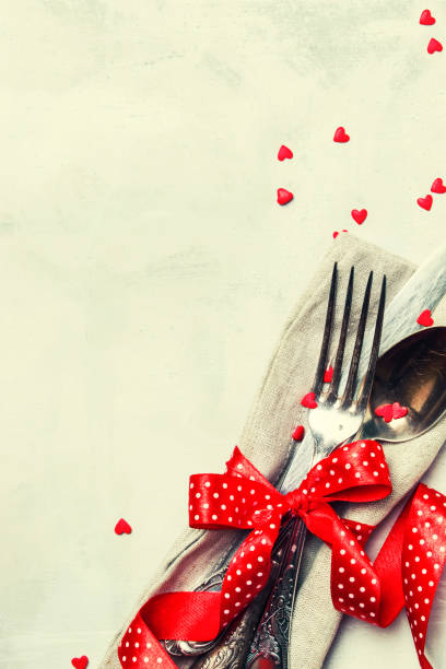 istock Festive table setting for Valentines Day, set of cutlery 912088270