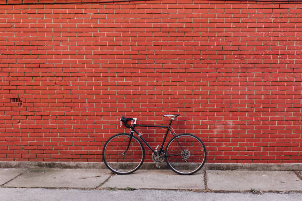 istock Brick wall and bike 912088590