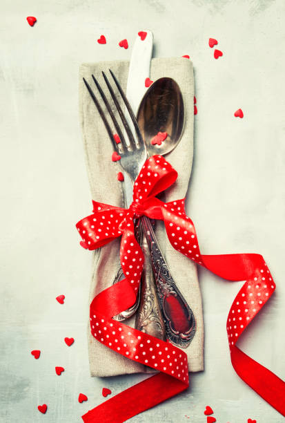istock Festive table setting for Valentines Day, set of cutlery 912091334