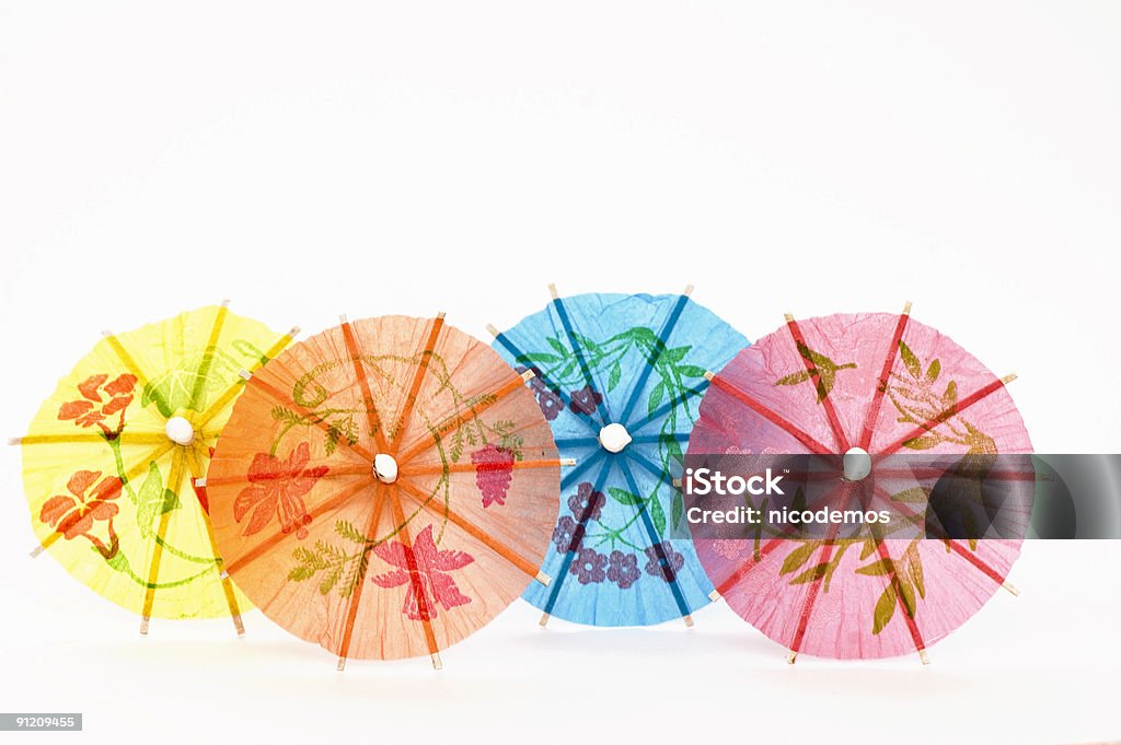 Quattro colori di ombrelloni - Foto stock royalty-free di Bianco