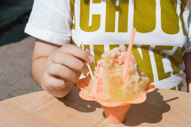 istock Midsection Of Woman With Ice Cream On Table 912096468