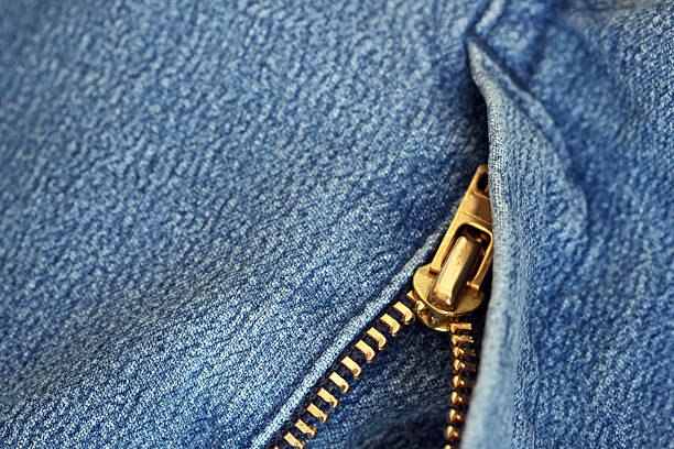 fecho de correr e macro blue jeans - materialpromo imagens e fotografias de stock