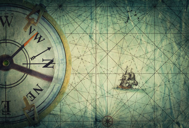 istock Compass on vintage map. Adventure, travel, stories background. 912108332