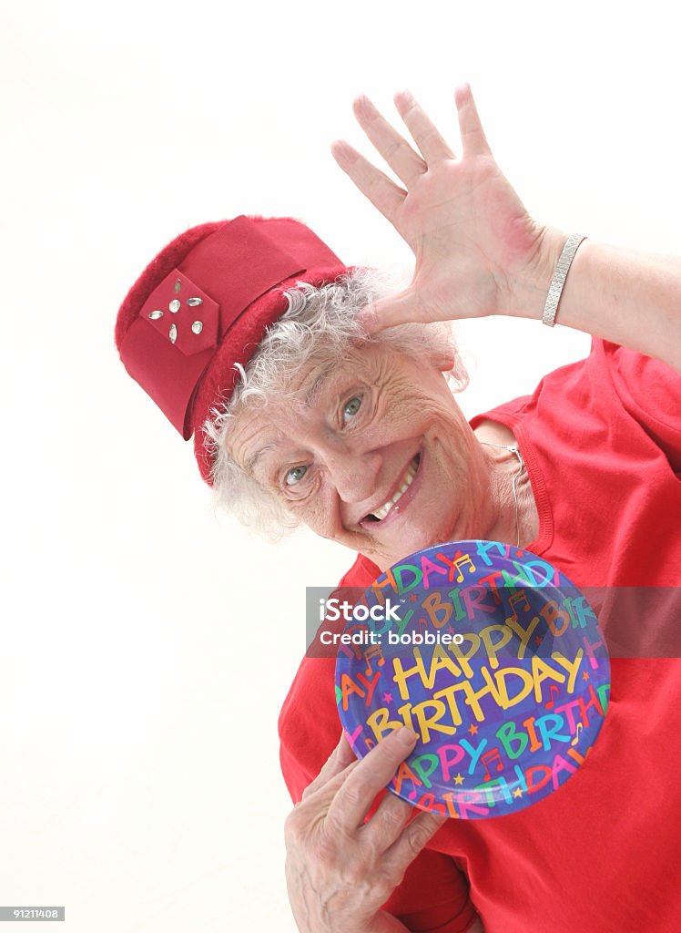My Birthday Senior woman holding a birthday plate 60-69 Years Stock Photo