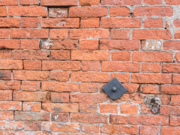 istock Old Brick Red Wall repairing 912114080