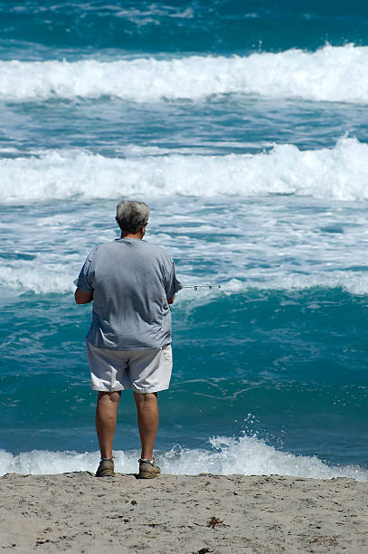 istock surf fishing 91212023