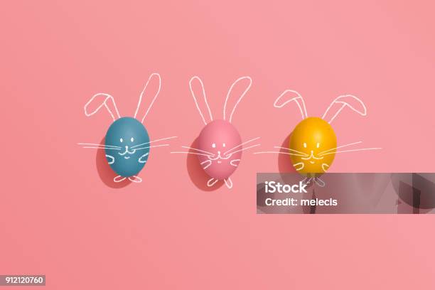 Easter Egg Rabbits On Pink Background Stock Photo - Download Image Now - Easter, Easter Egg, Easter Bunny